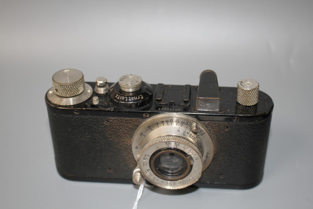 An Ernst Leitz 35mm camera, no. 150854, with Elmar 1:35 50mm lens, 13cm, height 7cm